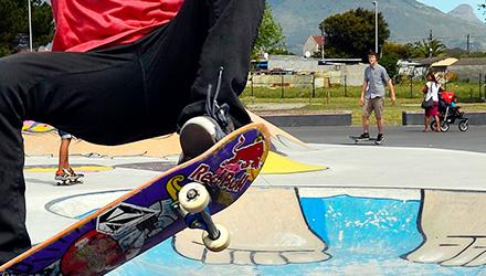 Skateboarding workshop pops and grinds